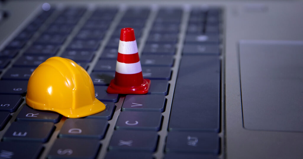 warning under construction , website under maintenance , troubleshooting and fixing